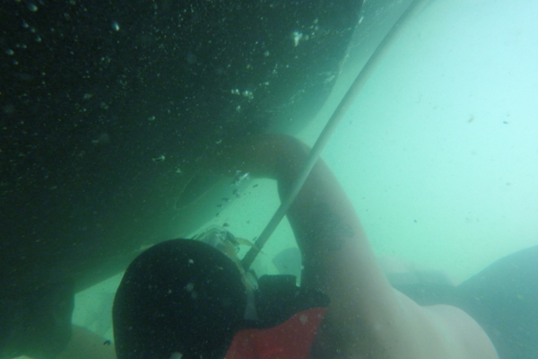 Jay cleaning boat bottom